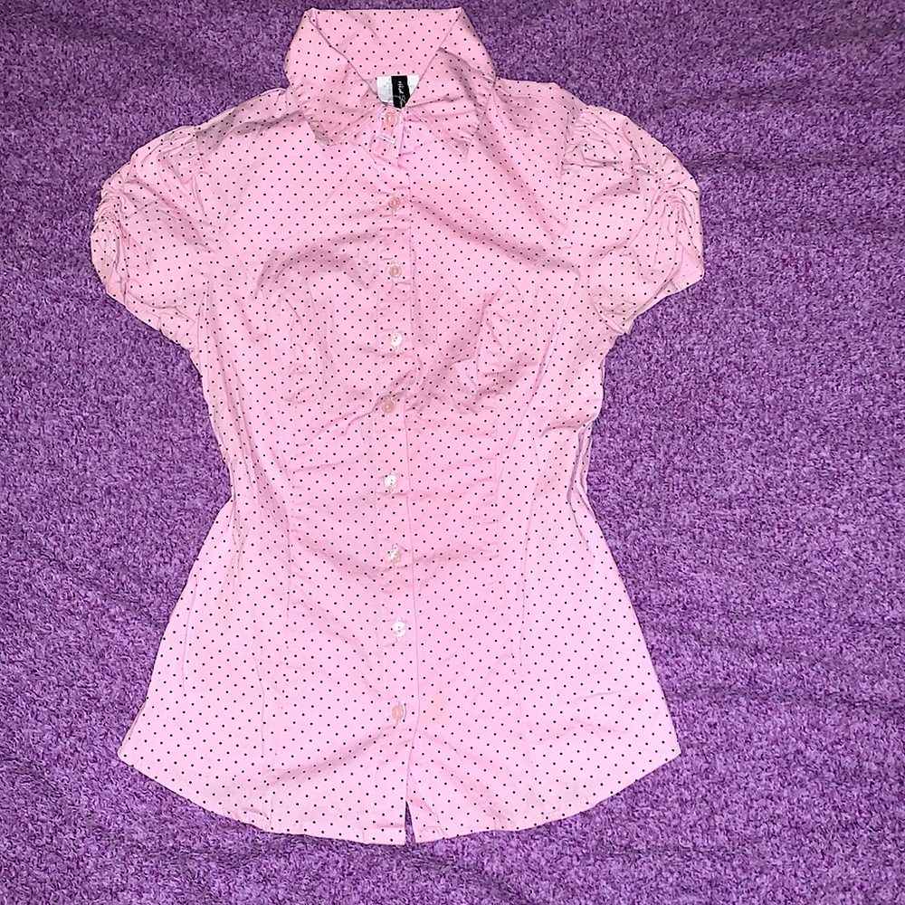 Pink blouse. Polka dots.
